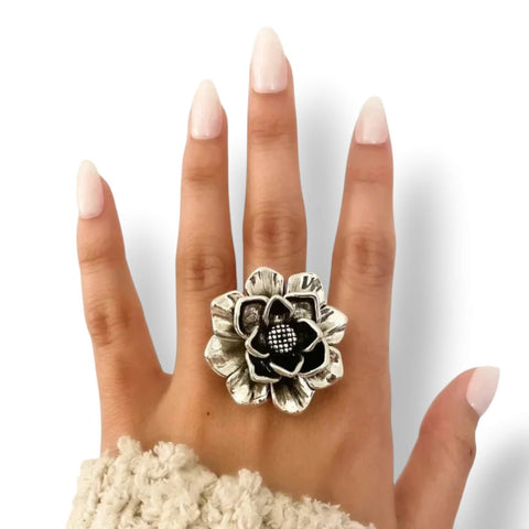 woman wearing Sterling Silver Antique Flower Statement Ring with 3D floral petals and dark center 9