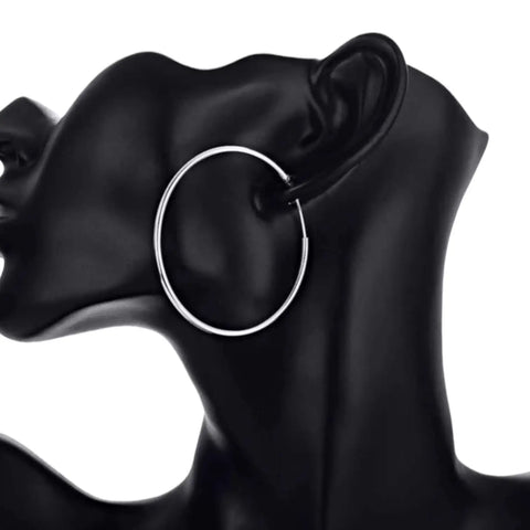 Sterling Silver Endless Hoop Earrings in oversized 55mm hollow tube design with polished lightweight finish