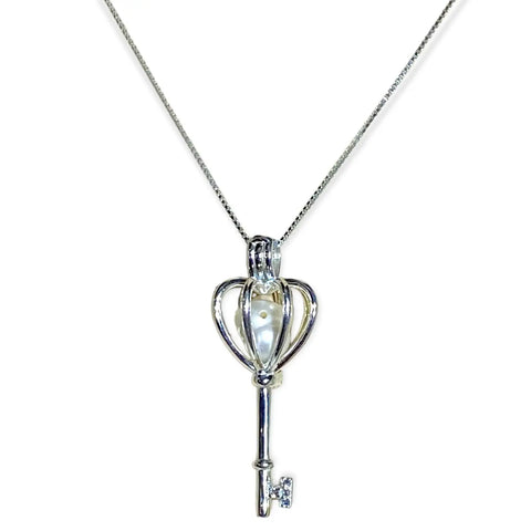 Sterling silver heart crown skeleton key pendant with faux pearl on dainty chain – necklace flat lay on neutral background