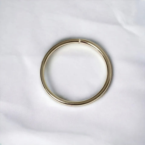 Single item flat lay Sterling Silver Split Round Bangle