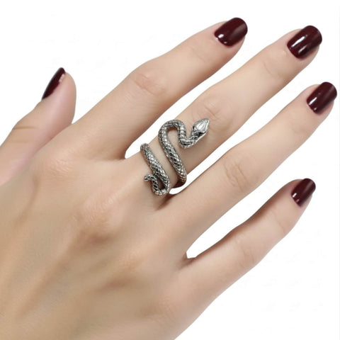 woman wearing on middle finger Sterling Silver Bite Me Snake Wrap Ring with antique silver textured serpent design