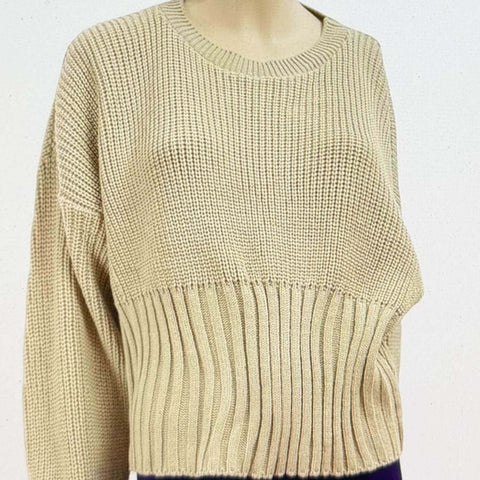 Tan Long Sleeve Rib Knit Crop Sweater displayed on a mannequin, featuring a cozy oversized fit and textured design.