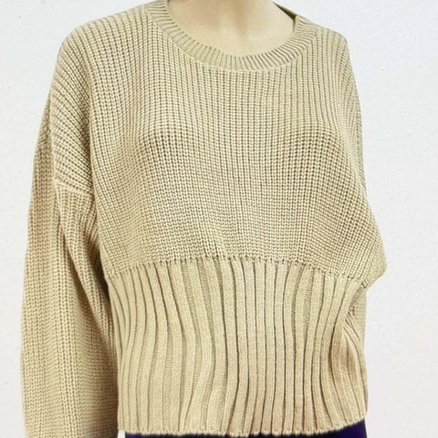 Tan Long Sleeve Rib Knit Crop Sweater displayed on a mannequin, featuring a cozy oversized fit and textured design.