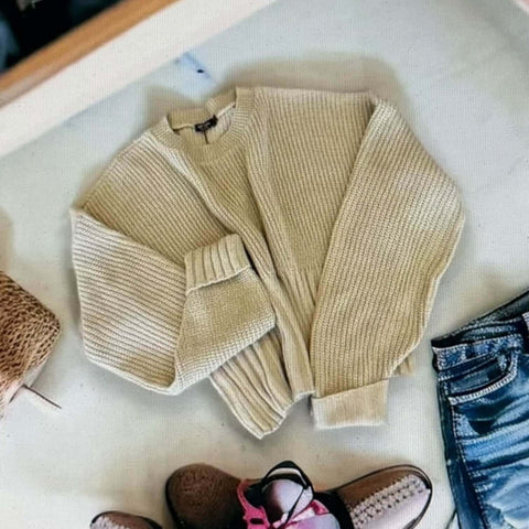 Tan Long Sleeve Rib Knit Crop Sweater laid flat, showcasing a soft, oversized design suitable for cozy layering.