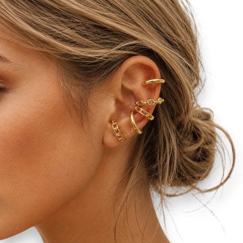 woman wearing Trendy Gold Stackable Ear Cuffs Set with 5 no-piercing cartilage cuffs in minimalist gold plated 