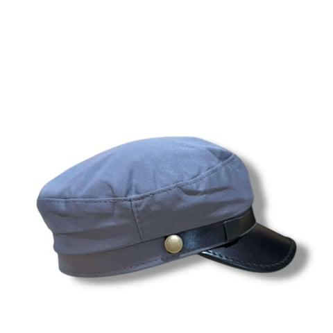 Two Tone Cotton Flat Top Fisherman Cap black faux leather curved brim, and gold button band in gray