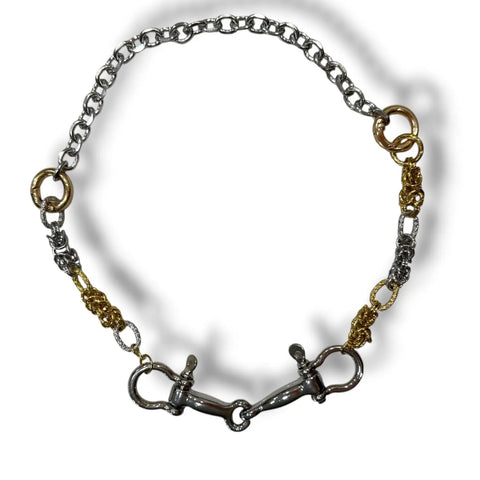 Two tone shackle necklace with silver and gold chains, twin drops and equestrian-inspired metal hardware