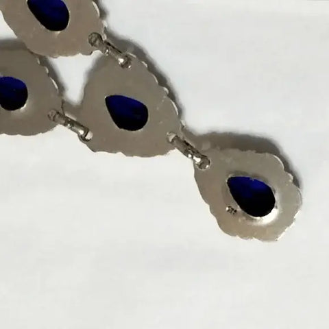 Victorian sterling silver Y necklace with dark royal blue pear crystals and matching drop earrings
