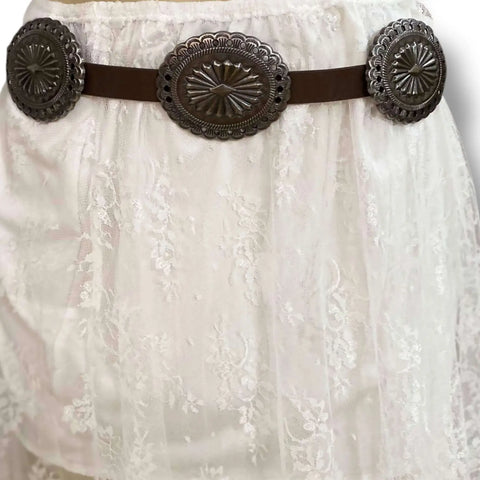 dark brown Western Leather Silver Concho Buckle Belt on white floral maxi skirt