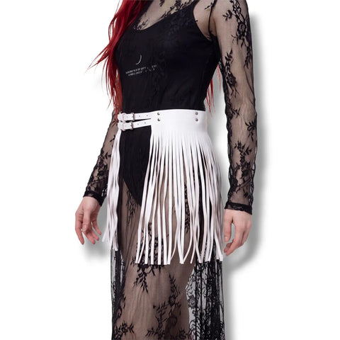 White faux leather skirt fringe belt with dual buckles, studded accents, and long tassel fringe