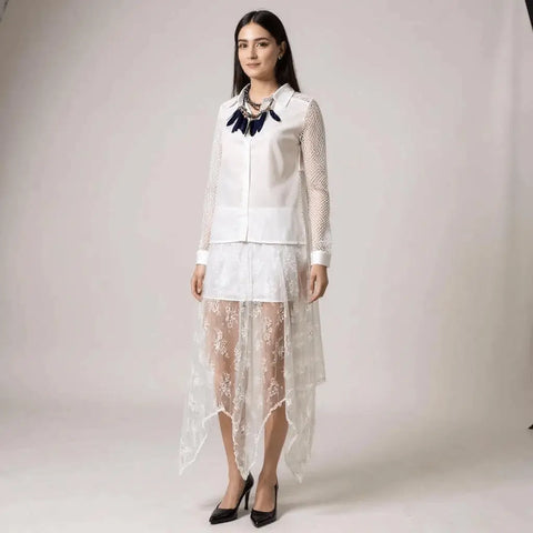 woman wearing white top blue feather choker with White Floral Lace Sheer Asymmetrical Midi Skirt with partial lining, elastic waist, and flowy hanky hem