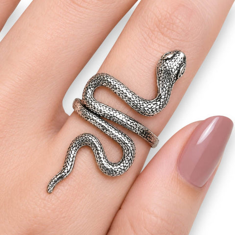 woman wearing index finger Silver Crawling Snake Wrap Ring with antique silver textured serpent design