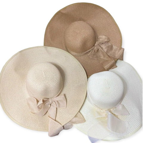 Summer wide brim straw sun hat with linen bow and UPF 50+ protection, perfect for boho chic beach style.
