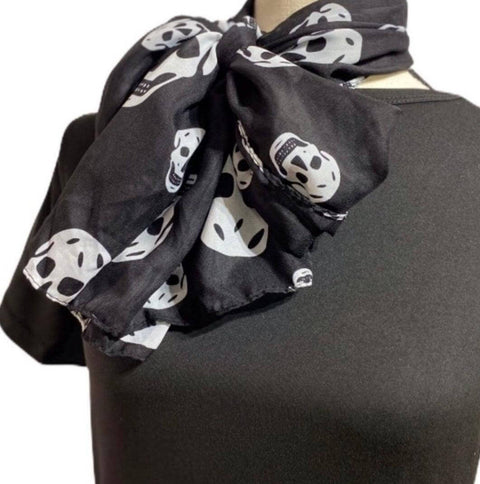 Year Round Skulls Long Scarf black and white skull print scarf styled as an edgy neck wrap