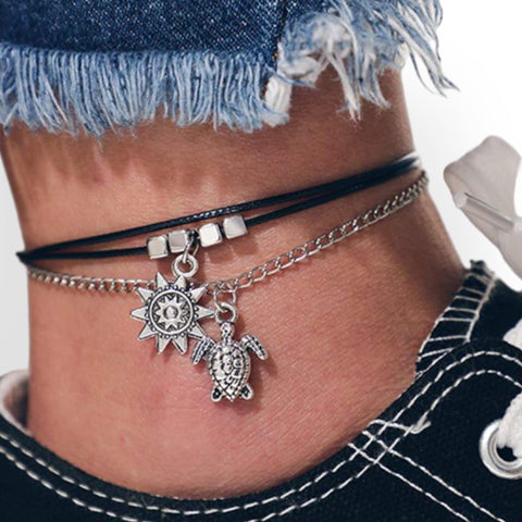 Boho coastal charm anklet with turtle, sun, and geometric beads