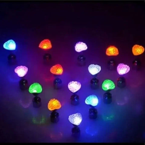 Light Up glowing LED heart post earrings with stainless steel backings on white background
