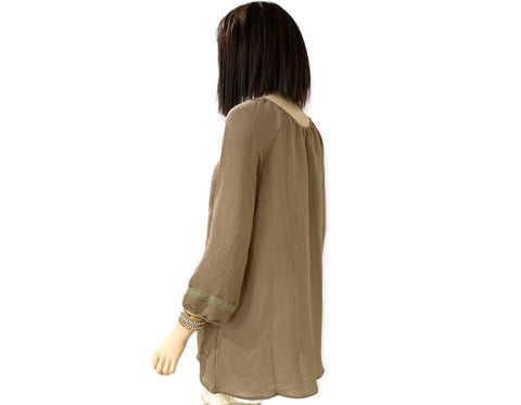Boho olive green tunic top with embroidered panels, tassel tie keyhole, and elastic 3/4 sleeves, plus-size fit.